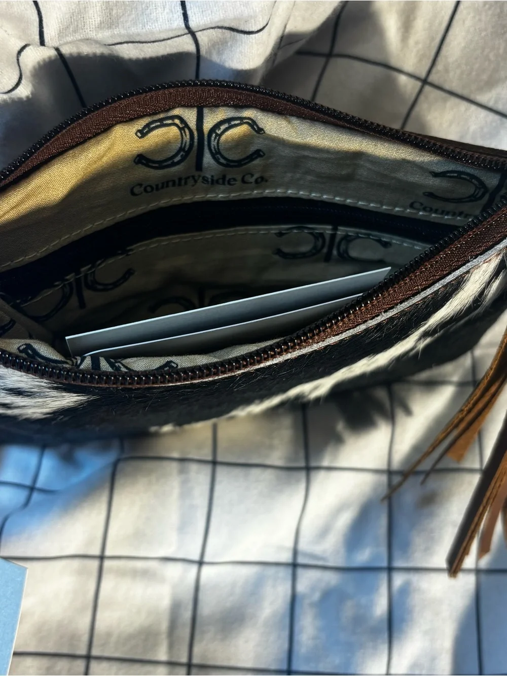 Countryside Co. Black & White Cowhide Wristlet